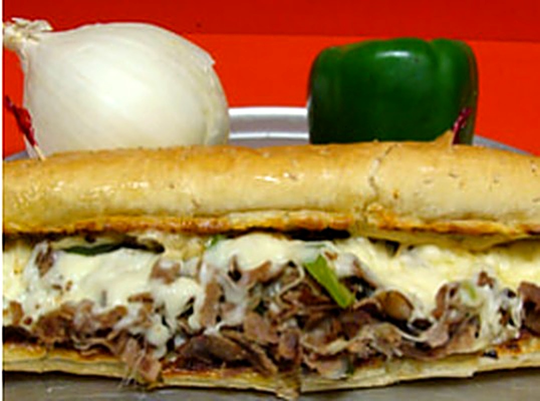 Steak and cheese sub with peppers and onions